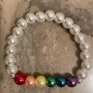 6 1/2”-6 3/4”wrist. Rainbow glass PRIDE white bracelet: Double glued/hidden knot